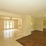 Living/Dining area has beautifully finished hardwood flooring.