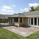 Lots of possibilities for this large patio. All exterior doors and windows were replaced.