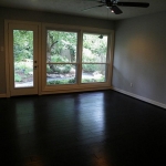 Master Bedroom with wall of glass looking out to the Zen Garden. Exterior access to gardens.