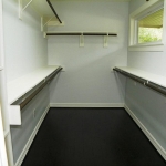 Master closet is large with double and long hanging spaces.